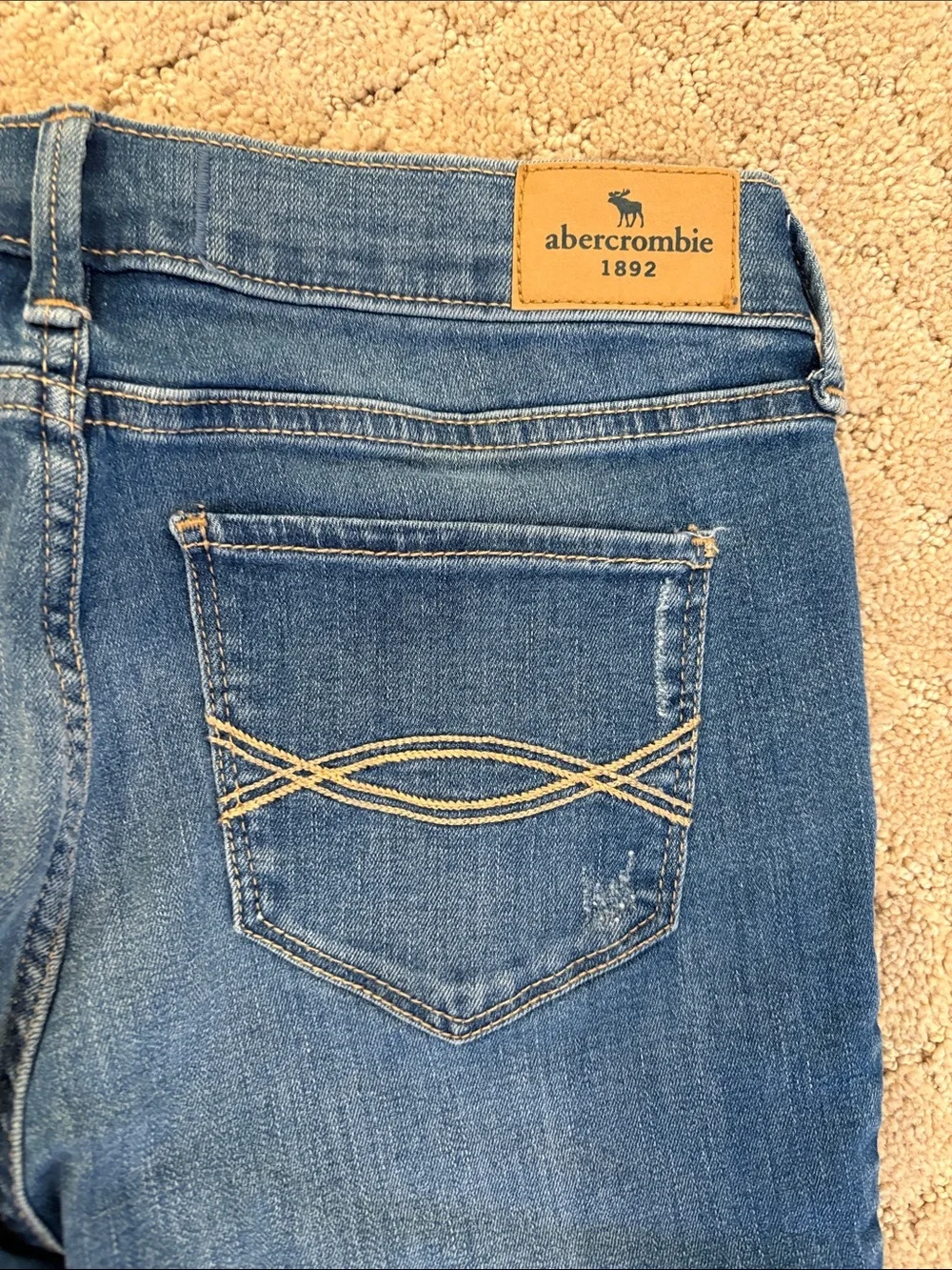 abercrombie kids Dark Blue Skinny Jeans with Light Distressing